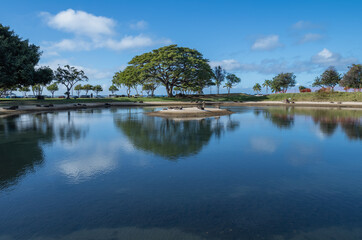 Fototapeta na wymiar Blue Lagoon with a Small Islet in Hawaii.