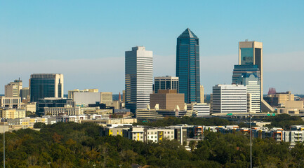 Fototapeta na wymiar Aerial view of Jacksonville city with high office buildings. View from above of USA glass and steel high skyscraper architecture in modern american midtown