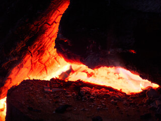A burning bonfire. Burning logs.