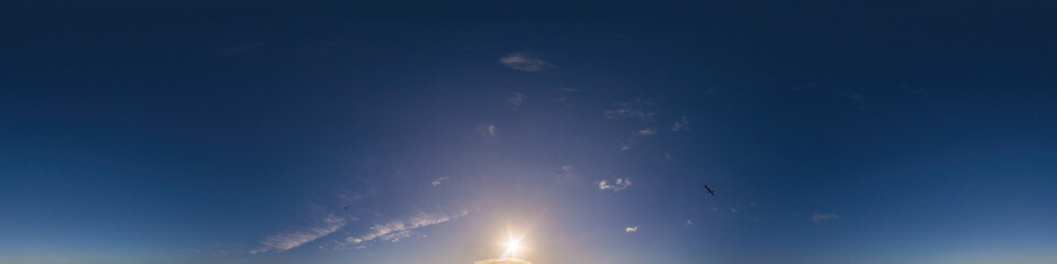 Dark blue sunset sky panorama with Cirrus clouds. Seamless hdr pano in spherical equirectangular format. Complete zenith for 3D visualization, game and sky replacement for aerial drone 360 panoramas.