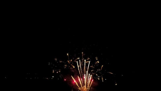 Drone View of July 4th Fireworks, Captured at Half Speed, With Multiple Bursts in all Colors