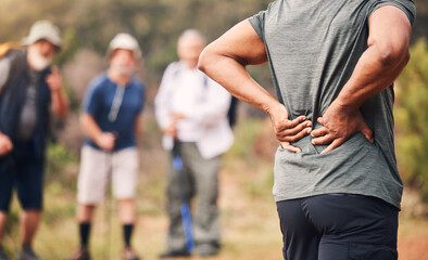 Man with back pain, exercise injury and outdoor hiking, spine and health, muscle tension and...