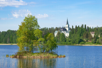 Obraz premium June landscape with ancient Lutheran church. Ruokolahti, Finland