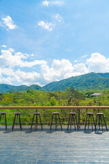 empty bench and bar stool on balcony