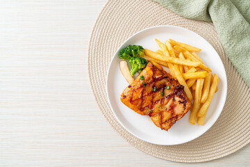 grilled chicken steak with potato chips or french fries