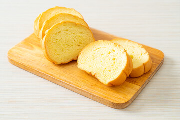 potatoes bread sliced on wood board