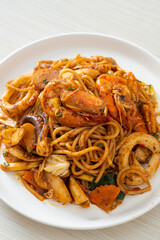 stir fried Tom Yum seafood dried spaghetti