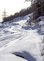 Winter road in the highlands, morning dawn, walking in the fresh air.