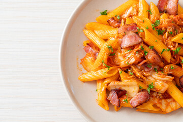 stir-fried penne pasta with kimchi and bacon