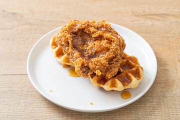 fried chicken waffle with honey or maple syrup