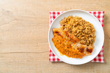 grilled chicken steak with red curry sauce and rice