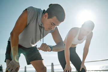 Fitness, tired couple and running time on blue sky for health and wellness outdoor. Man and woman in nature for workout performance and healthy lifestyle for body fatigue with lens flare and progress