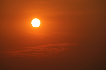 sunrise back over red sky with clear orange cloud in the morning