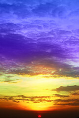 Sunset colorful red orange purple cloud on light and dark orange sky