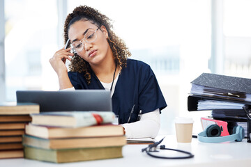 Nurse, tired or stress in hospital education, wellness books study or research laptop learning in...