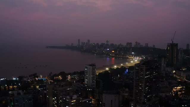 Mumbai Marina drive aerial drone view at sunset night, India, Maharashtra, 4k cinematic