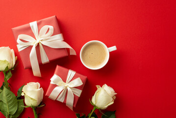 Saint Valentine's Day concept. Top view photo of gift boxes with ribbon bows white roses and cup of fresh coffee on isolated red background