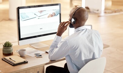Black man, call center and computer for tech support, communication and crm help at desk in office....