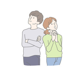 笑顔で上を向く若い男女、夫婦