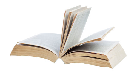 A thick open book lies on the table. Knowledge and education. Close-up. Isolated on a white background.