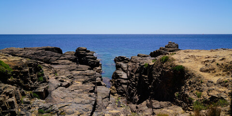Fototapeta na wymiar rock stones talmont coast access to the beach vendee Atlantic in france