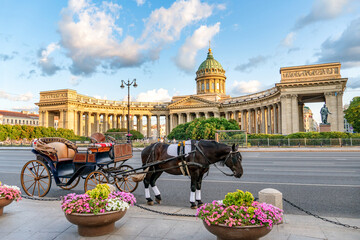 Russia, St. Petersburg, a carriage in front of the Kazan Cathedral, a tourist attraction on Nevsky...