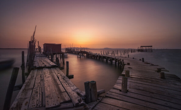 Sunset fishermen port Carrasqueira in Portugal