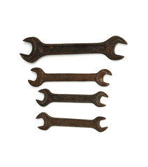Hand tools. Carob keys of different size on white background