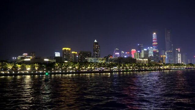Zhujiang New Town Guangzhou from the boat of Pearl River Cruise by night. Guangdong, China.