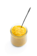 Vegetable puree in a glass jar isolated on white