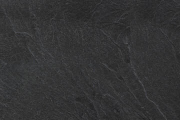 Dark grey black slate background or texture.