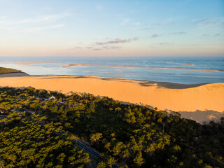 East side drone aerial view of the Dune du Pilat and the Landes pine forest in Arcachon Aquitaine France