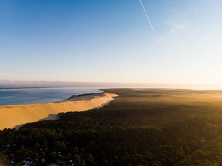 Aerial panorama view of Dune du Pilat Pyla with pine forest in sunset in Arcachon France