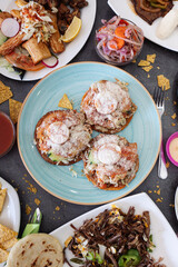 Enchiladas Plate In the center among other traditional dishes of Salvadoran cuisine