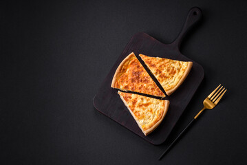 Beautiful delicious quiche pie with four types of cheese with spices and herbs