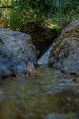 Waterfall in the deep forest on the top of the mountain.