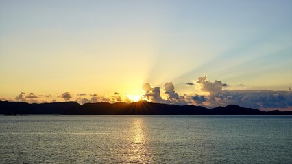 Naklejka premium 沖縄県慶良間諸島慶留間島から見た朝の渡嘉敷島