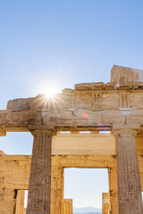 Fototapeta premium Ancient column at Acropolis site on a sunny evening in Athens Greece