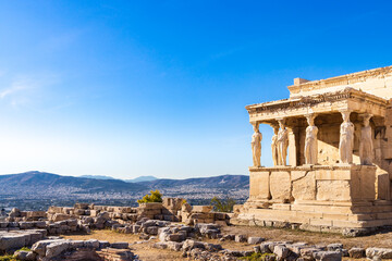 Porch of the Caryatids at temple of Athena Pollias or the Erechtheion at Acropolis site on a sunny evening in Athens Greece