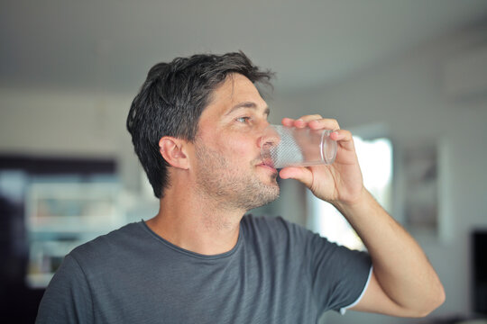 portrait of man while drinking water