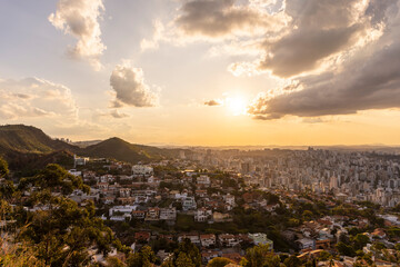 Beautiful view from viewpoint to city and sunset clouds