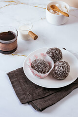 homemade round chocolate candy with coconut sprinkles