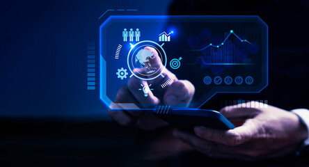 Businessman holding mobile phone and touching on virtual screen icons for business management, strategy, vision and plan