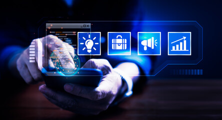 Businessman using mobile phone with virtual screen icons for business management, strategy, vision and plan
