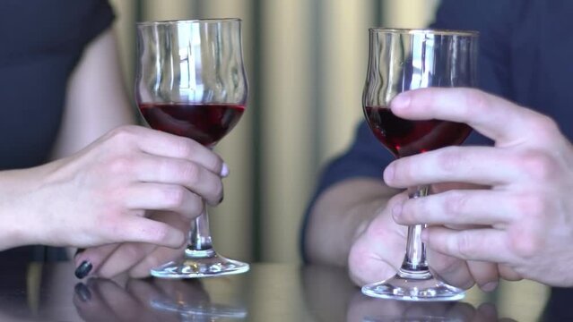 Hands Clinks Glasses With Red Vine Slow Motion