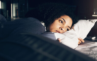 Anxiety, depression and woman in bed with insomnia, thinking and trying to sleep while sick....