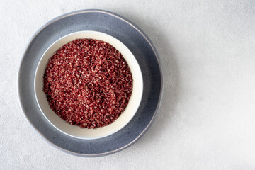 Red wine flavored salt in a bowl. Gourmet condiment to aromatize and season food Dessert, Seafood, Meats, Pasta, Sauce, Finishing Salt