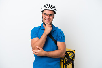 Young caucasian man with thermal backpack isolated on white background with glasses and smiling