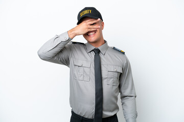 Young caucasian security man isolated on white background covering eyes by hands and smiling