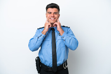 Fototapeta premium Young police caucasian man isolated on white background smiling with a happy and pleasant expression